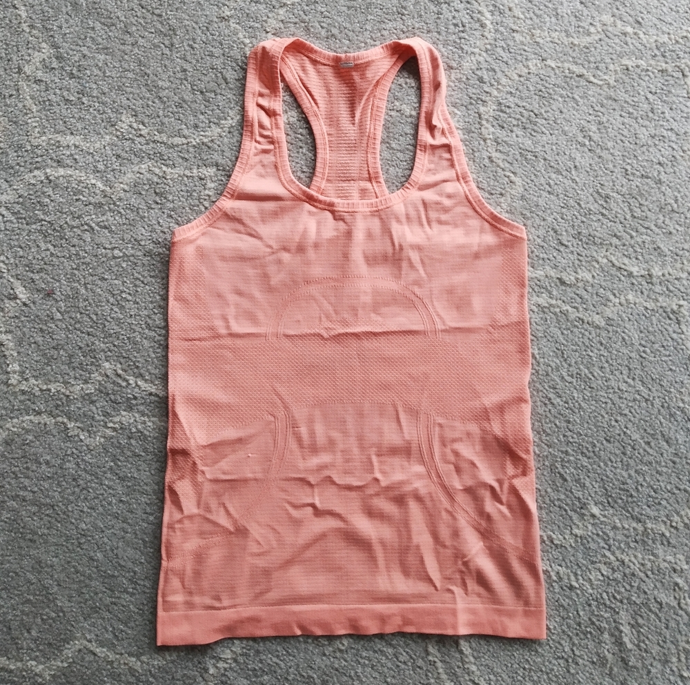 Lululemon salmon pink workout top in size 2